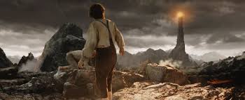 Frodo takes steps in Mordor towards the eye of Sauron in the film Lord of the Rings return of the King