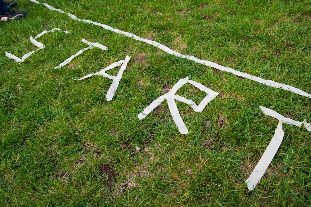 grass with a start line and the word start created from masking tape